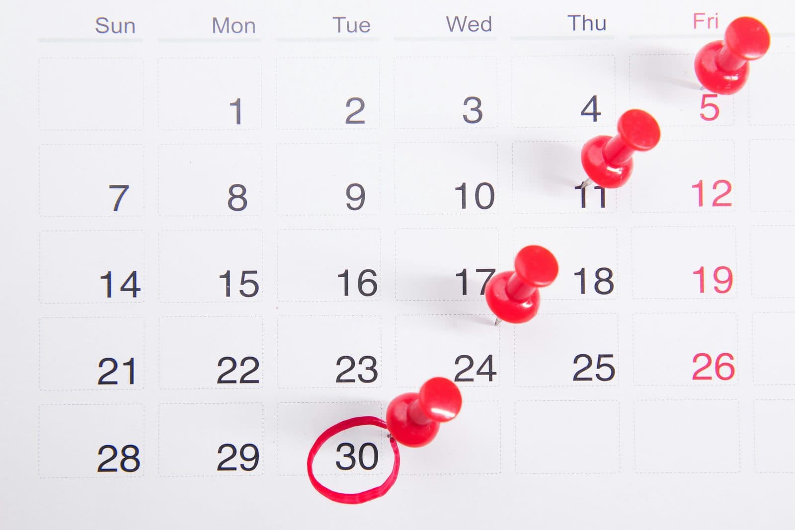 A calendar with a closing date circled